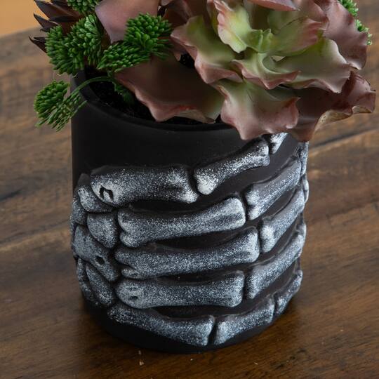 9" Artificial Halloween Succulent Garden in Skeleton Hand Planter